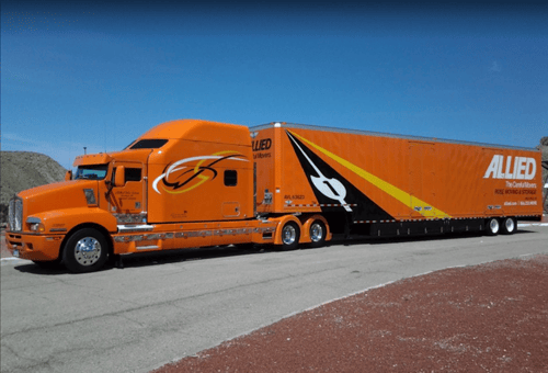 Rose Moving & Storage orange moving truck.