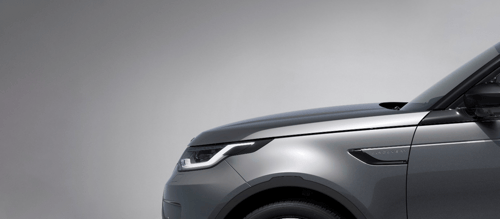 Grey Discovery vehicle on a grey background