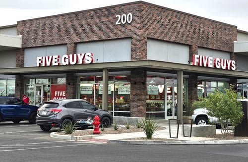 Exterior photograph of the Five Guys restaurant at 37666 North Gantzel Road in Queen Creek, Arizona.