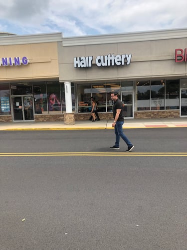 The front entrance of Hair Cuttery at Airport Square.