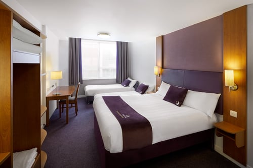 Premier Inn family room with double bed and two single beds