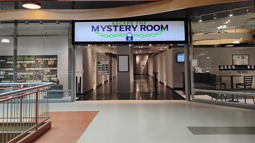 Escape the Mystery Room Storefront located at Destiny USA Mall in Syracuse, NY with multiple escape room themes that are perfect for all ages.