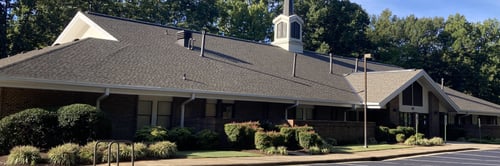 christian church building and parking lot