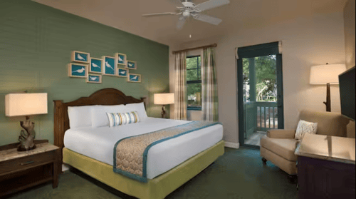 Disney's Hilton Head Island Resort 1 Bedroom Villa Bedroom and View to Balcony