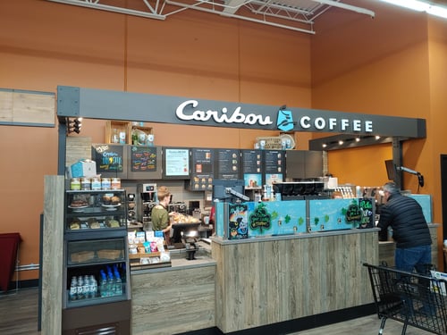 Storefront of the Caribou Coffee at 1050 River Place Mall in Amery