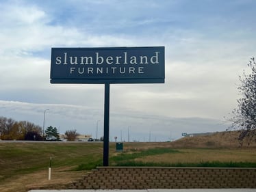 Pierre Slumberland Furniture store sign