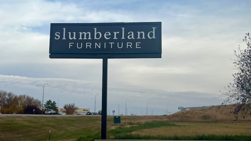 Pierre Slumberland Furniture store sign