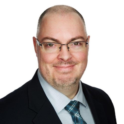 Headshot of Derek Levesque.