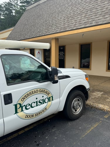 Photo of Precision Garage Door Truck outside the business