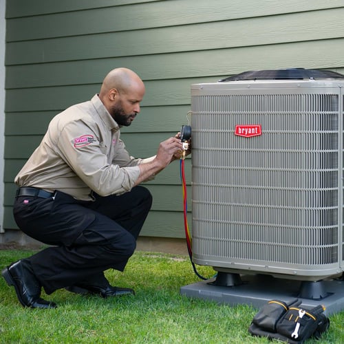 Bryant dealer finishes performing heat pump repair