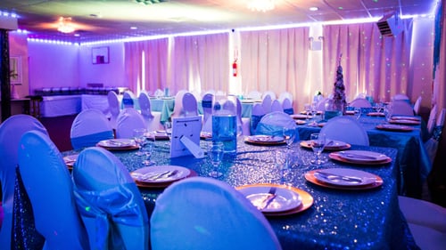 tables set for party in venue
