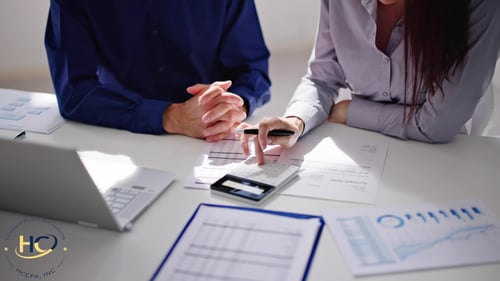 Two people going over financial documents