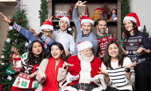 The Eydt Wealth Partners team  Christmas photo with Santa.