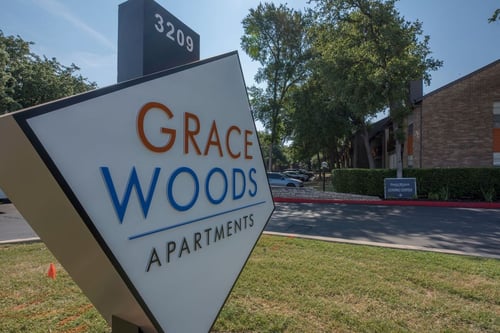 Grace Woods - Business Logo at the Entrance