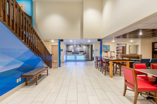 Enjoy a lobby that blends comfort, space, and warm details.