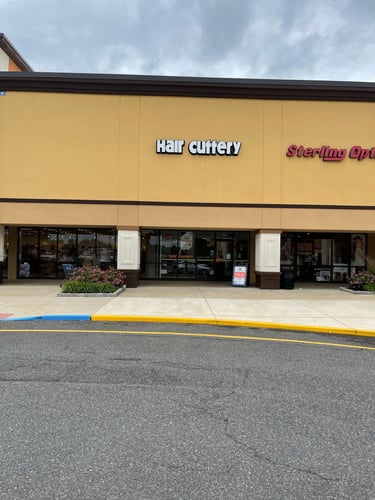 The front entrance of Hair Cuttery at Court at Deptford.