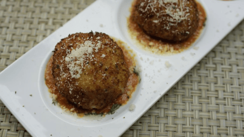 large meatballs on white plate