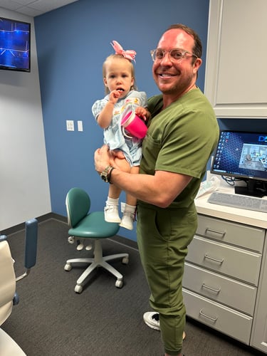 Dr. Beville with patient