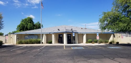Front view of the school building with a welcoming entrance, designed to create a safe and friendly environment for children and families.