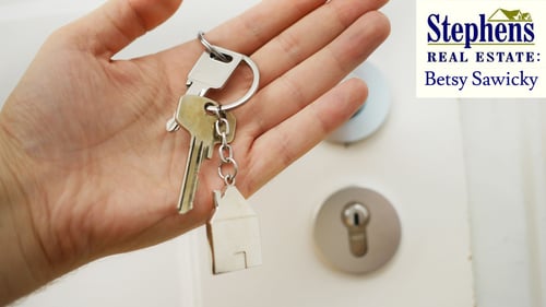 hand holding keys to new home