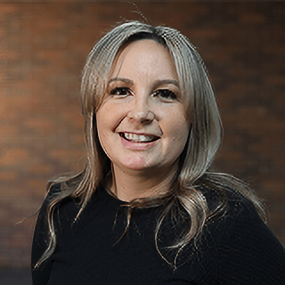 Headshot of Genesis Evans