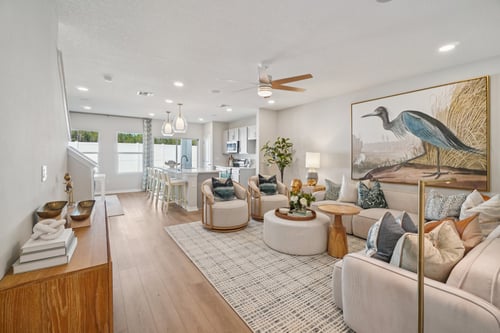 The Living Room  of a DRB Homes Leila Home Plan at Twin Oaks in Zephyrhills, FL.