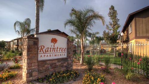 Building exterior at Raintree Apartments in Highland, CA 92346