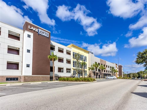exterior of building at Lake Lofts at Deerwood in Jacksonville, FL