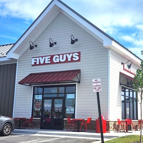 An exterior photograph of the Five Guys restaurant in Haymarket Virginia.
