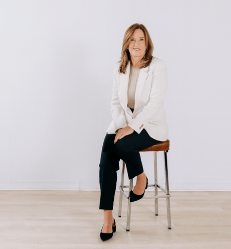 Portrait of Janice Domaratzki sitting on a chair