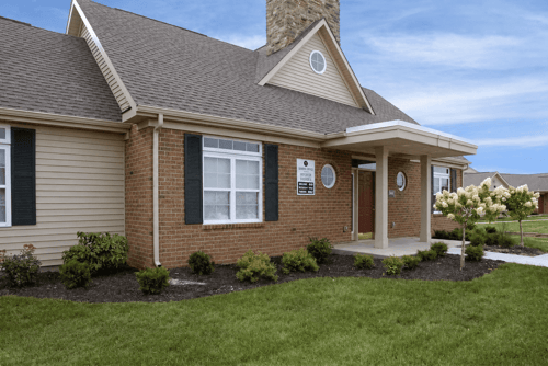 A house with a brown roof and a brick facade.at Abbie Cove, Canal Winchester, OH, 43110