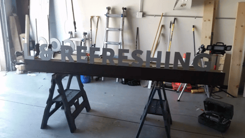 custom sign being designed