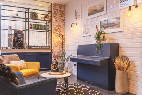 Follow the modern tunes straight into our welcoming lobby