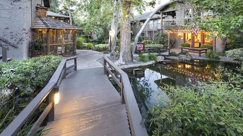 a bird aviary with lights at dusk at The Aspens Riverside in Riverside, CA, 92504