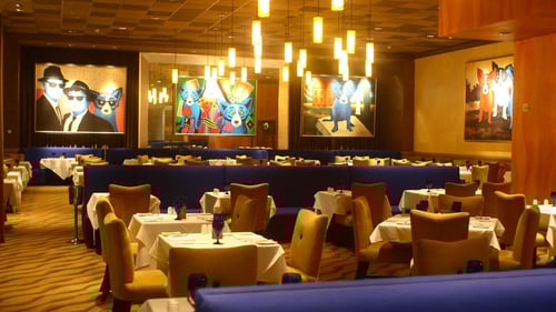 The Steakhouse at Caesars New Orleans. Caesars New Orleans is home to The Steakhouse conveniently located inside the Casino at 8 Canal Street. Open Wed-Sundays. The Steakhouse pays homage to the legendary flavors and spirit of New Orleans. Our menu features steakhouse classics infused with local flavors and regional ingredients. Filet mignon, NY strips, ribeyes and seasonal specials are offered along with locally sourced seafood to bring the soul of the South to life. Enjoy exceptional service paired with an award-winning wine list. White linens, rich blue banquets, and eye-catching prints by George Rodrigue create an elevated atmosphere to savor spectacular steakhouse fare. Sip a cocktail or glass of wine at the impressive Vegas-style bar and catch a glimpse of Chef Paul Robert creating delicious plates in the open-concept kitchen.