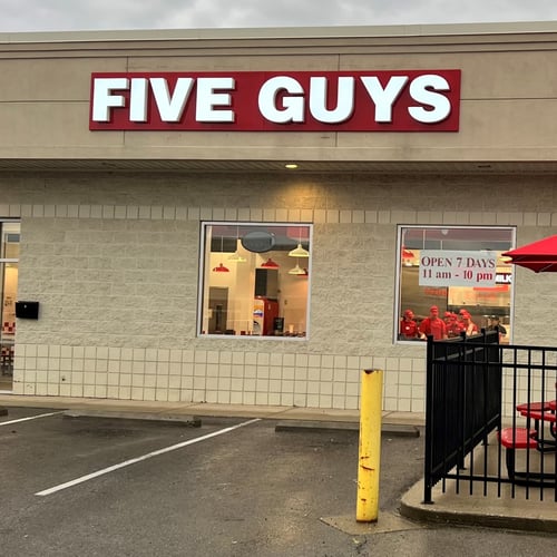 Exterior photograph of the Five Guys restaurant at 1780 Tiffin Avenue in Findlay Ohio.