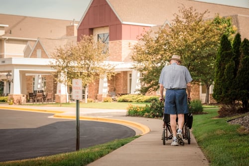 A resident walks toward the entrance of Saint Therese of Oxbow Lake in Brooklyn Park, Minnesota.