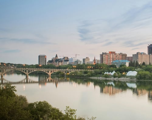 Image of Saskatoon with the South Saskatchewan River and downtown in the background.