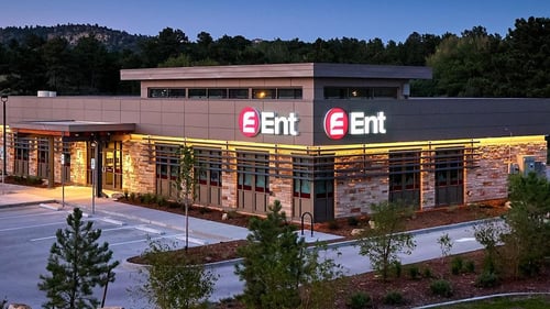 Exterior photo of Ent Credit Union University Service Center at dusk