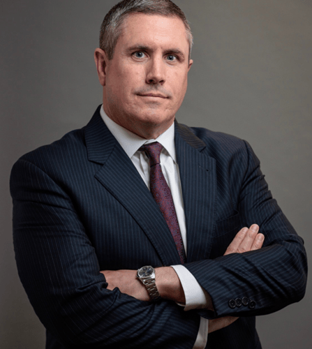 A headshot image of Nick Armiger.