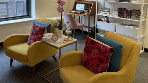 two yellow chairs in an office