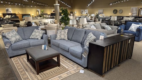 Amery Slumberland Furniture blue sofa and loveseat with matching pillows