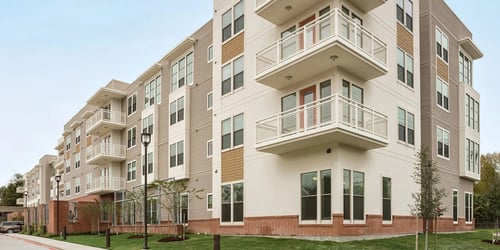 An exterior photo of The Village of The Heights.