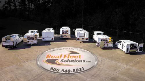 real fleet solutions cover image with upfit models of trucks lined side-by-side