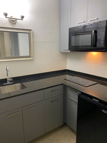 Kitchen with granite countertops at Colonial Drive Apartments, Orlando, FL