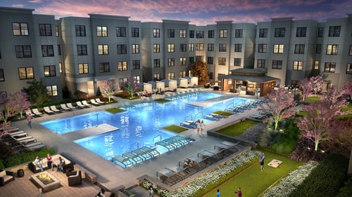 Rush apartment complex and resort style pool at sunset