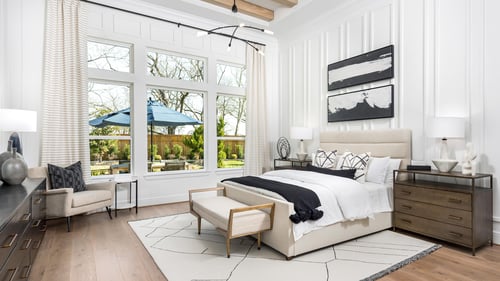 Luxurious primary bedroom suite