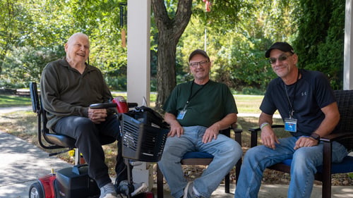 Members of Millview sitting outside