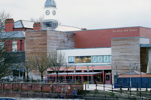 A view of Caldo Lounge from a distance, showcasing its proximity to The Robert Bolt Theatre.