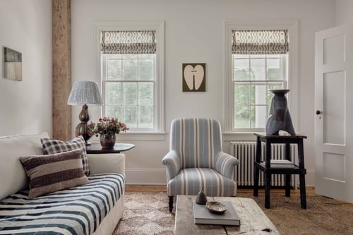 Custom living room blinds and draperies providing light control and style